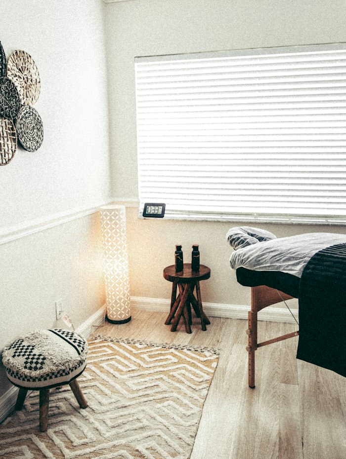 Modern massage studio interior with white walls