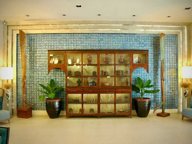 Quiet seating corner with plants in a wellness space